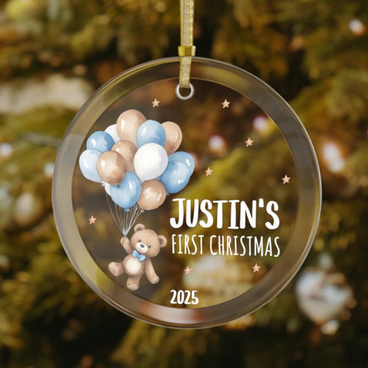 Personalized baby’s first Christmas glass ornament with teddy bear holding balloons, stars scattered in the background, custom name and year keepsake, holiday decoration
