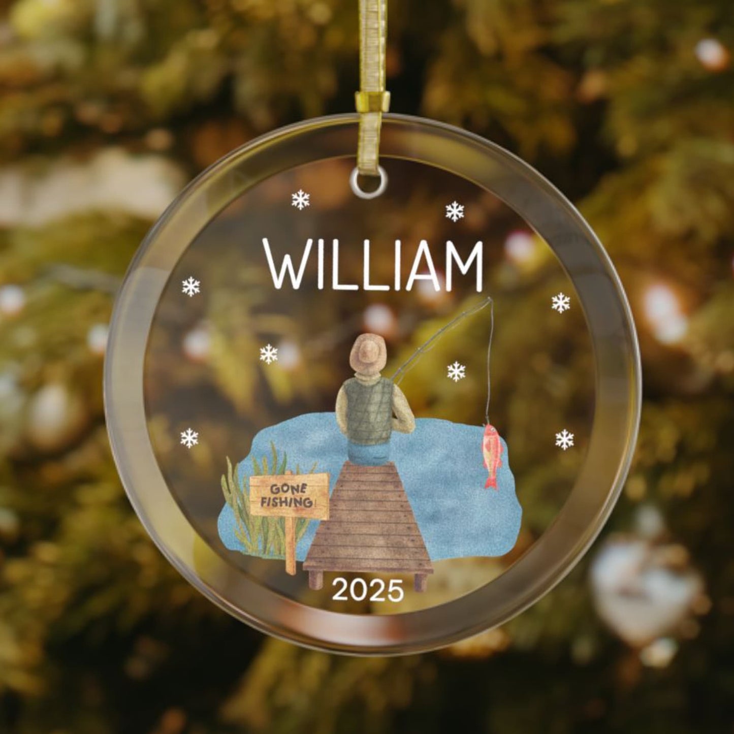 Personalized fishing Christmas ornament featuring a man sitting on a dock with a fishing rod, "Gone Fishing" sign, snowflakes around the design, custom name at the top, and the year at the bottom.