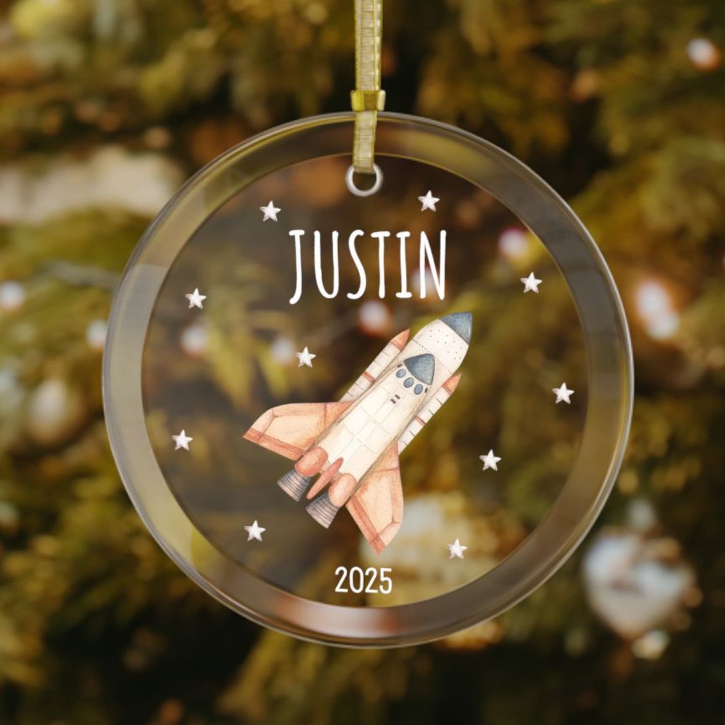 Personalized space shuttle Christmas glass ornament with custom name and year, featuring a vintage-style space shuttle and silver stars. A unique holiday gift for space loving kids and teens.