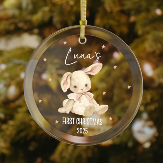 Personalized baby’s first Christmas ornament with cute stuffed bunny design, custom name and year keepsake, hanging on a Christmas tree
