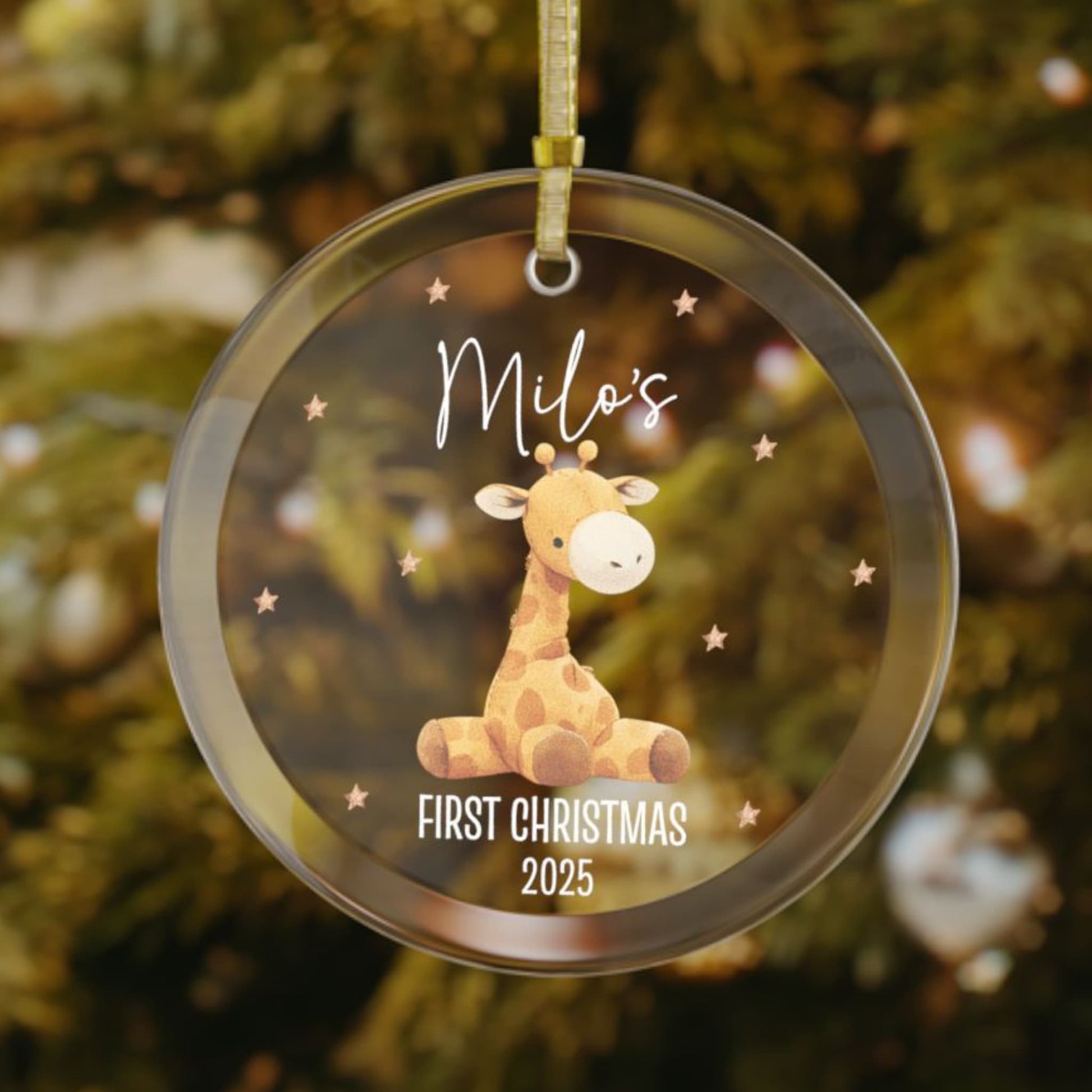 Baby’s first Christmas personalized ornament featuring a stuffed giraffe design, custom name and year, keepsake on Christmas tree