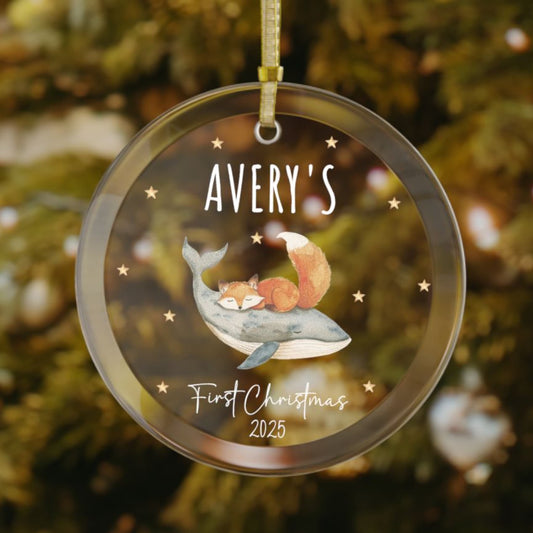 Personalized baby’s first Christmas glass ornament with adorable fox sleeping on top of a whale, stars scattered in the background, custom baby name and year keepsake, holiday decoration for Christmas tree